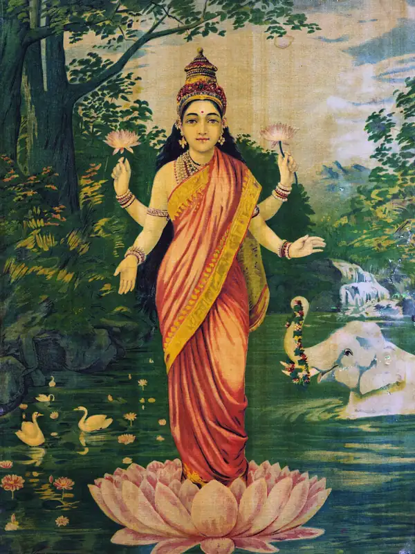 Mahalakshmi on a lotus, the painting on the cover of the Vedic Numerology Report